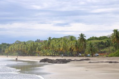 14 Mart 2023 - Kosta Rika 'da Puerto Corrilla, Guanacaste: Kosta Rika sahilinin tadını çıkaran insanlar
