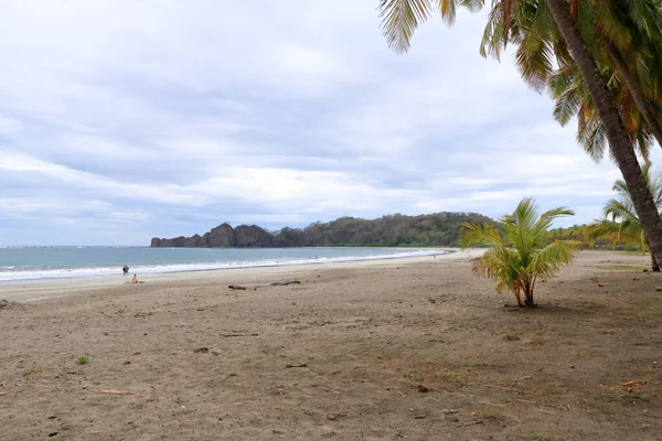 stock image March 14 2023 - Puerto Corrilla, Guanacaste in Costa Rica: People enjoying the beach in Costa Rica