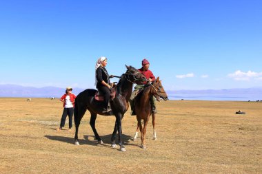 24 Ağustos 2023 - Kırgızistan 'da Song Kol Gölü: Kyz Kuuma' nın Performansı (kız kovalama), geleneksel binicilik sporu
