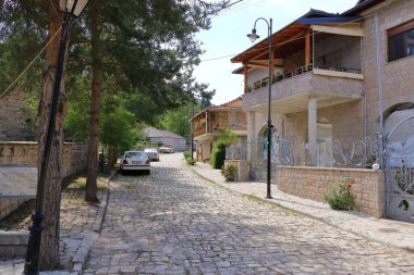 September 14 2023 - Voskopoja in Albania: lonely streets at lunchtime clipart