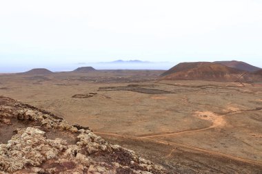 view to the northside with Lanzorate in the background from Volcan Calderon Hondo, Fuerteventura at Canary Islands, Spain clipart