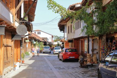 September 22 2023 - Gjakova in Kosovo: streetlife, people in the pedestrian zone of the city on a sunny day clipart