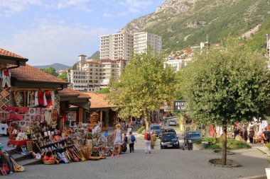 September 22 2023 - Kruja in Albania: People are walking on a pedestrian street in center the village clipart
