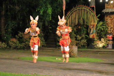 Ubud, Bali in Indonesia - January 31 2024: young dancers perform the rabbit dance clipart