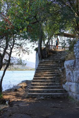 September 17 2023 - Butrint in Albania: people visit the ruined city, World Heritage Site by UNESCO clipart