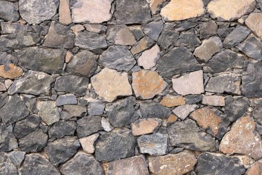 arkaplan olarak gri taş bir duvar