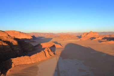 the aerial view of the famous Wadi Rum desert in Jordan, from a hot air balloon clipart