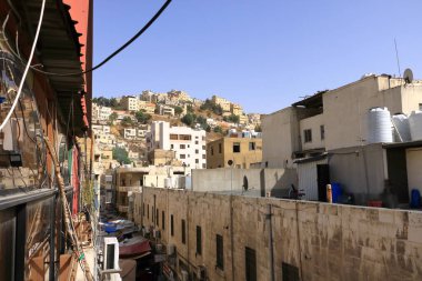 Amman in Jordan - May 18 2024: Cars in the oldtown on the busy Al-Hashemi street, view from above clipart