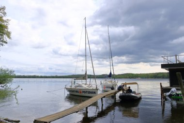 Potsdam, Brandenburg in Germany - April 14 2024: idyllic view of the Havel riverbank clipart