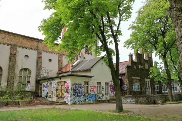 stock image Werder (Havel), Brandenburg in Germany - April 14 2024: ruined old restaurant and dance hall Friedrichshoehe on a cloudy day