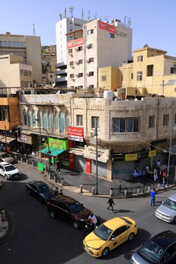 Amman in Jordan - May 18 2024: Cars in the oldtown on the busy Al-Hashemi street, view from above clipart