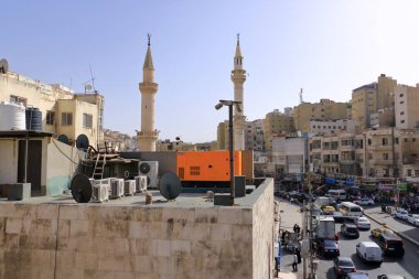 Amman in Jordan - May 18 2024: Cars in the oldtown on the busy Al-Hashemi street, view from above clipart