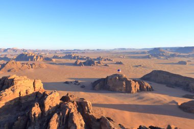 Hot air balloon above the mountains at sunrise in the famous Wadi Rum desert, Jordan clipart