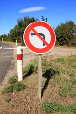 White Garden Snails Theba pisana on a traffic sign. Provence, Southern France in Europe clipart