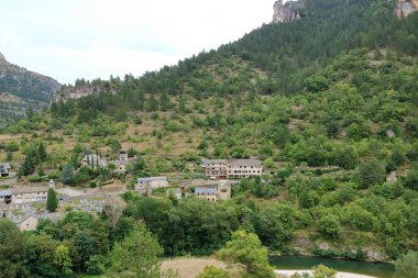 village of Sainte-Enimie in the Gorges du Tarn, one of the most beautiful villages in France. Occitanie, Lozere, Florac clipart