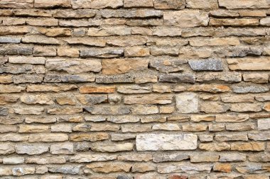 sarı bej rengi kum rengi taş tuğla dikey duvar