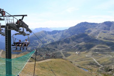 Ordino Arcalis, Mirador Solar de Tristaina in Andorra - August 30 2024: people use the chairlift to the mountain peak clipart