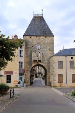 Noyers sur Serein in France, Europe - September 04 2024: Typical streets with old houses and some people clipart