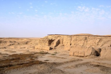 the equipment of the archaeologists who working at the excavation site in the Ancient City of Uruk, Iraq clipart