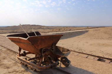 the equipment of the archaeologists who working at the excavation site in the Ancient City of Uruk, Iraq clipart