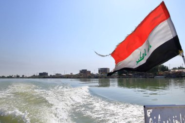 Shatt al-Arab river behind the Euphrates and Tigris confluence, Al-Qurna, Basra, Iraq clipart