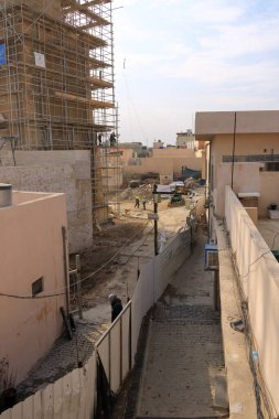 Musul, Irak Mussolosu - 17 Kasım 2024: El-Hadba, El-Hadbaa minaresinin El-Nuri Camii 'nin yanına yeniden inşası