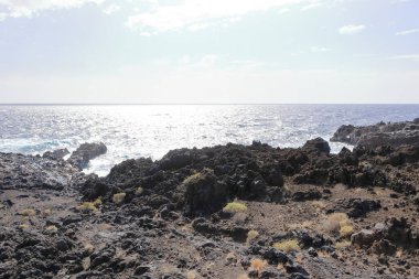 El Hierro 'nun güneybatı kıyısındaki Muelle de Orchilla' da güzel bir sahil şeridi. İspanya 'daki Kanarya Adaları