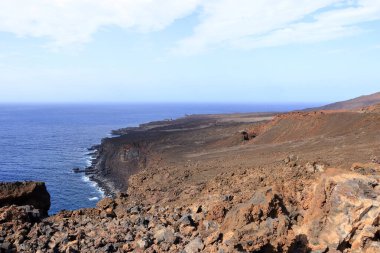 El Hierro 'nun güneybatı kıyısındaki Muelle de Orchilla' da güzel bir sahil şeridi. İspanya 'daki Kanarya Adaları