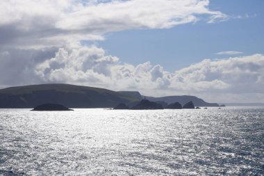 distant view to the north coast of the Shetland Islands (Unst island, Muckle Flugga Lighthouse), Scotland