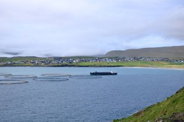Salmon fishing farm pools at Sandur, Sandoy, Faroe islands in Denmark