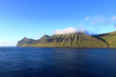 a view to the island of Kalsoy from the sea, Faroe Islands, Denmark