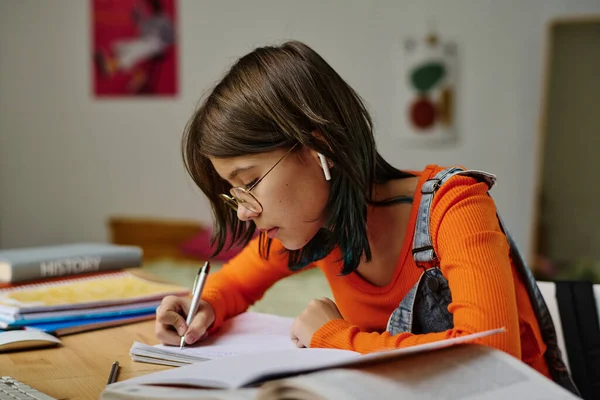 Schoolgirl Sitting Desk Her Room Making Notes Notebook She Doing — Stock Photo, Image