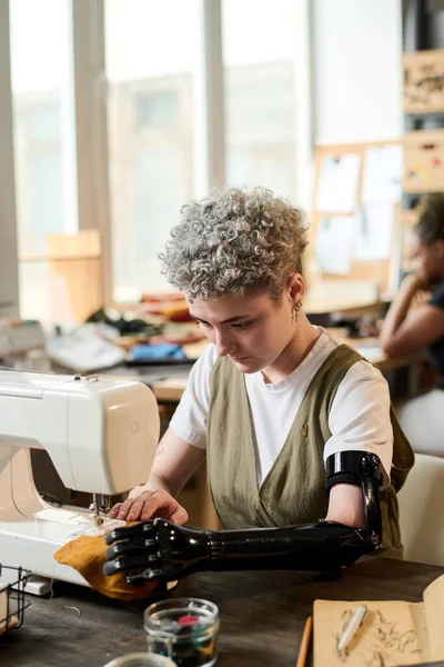 Contemporary Young Woman Disability Working Electric Sewing Machine While Sitting — Stock Photo, Image