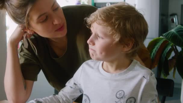 Tilt Shot Little Boy Sitting Kitchen Table Talking Happy Mother — Stock Video