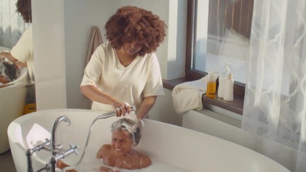 High Angle Shot Careful African American Mother Rinsing Shampoo Out — Stock Video