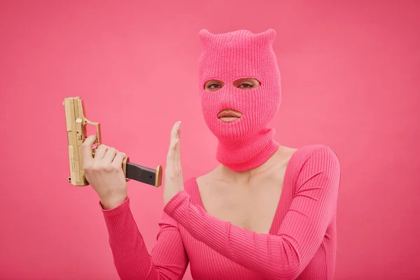 Portrait Criminal Girl Pink Balaclava Holding Gun Looking Camera She — Stock Photo, Image