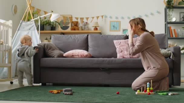 Mother Sitting Floor Kids Room Playing Peek Boo Cute Baby — Stock Video