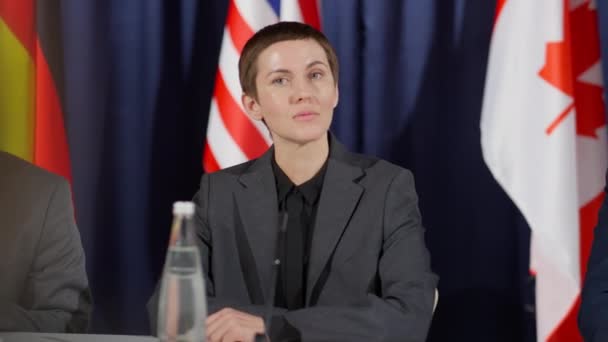 Young Caucasian Female Politician Talking Mic While Answering Questions Journalists — Stock Video