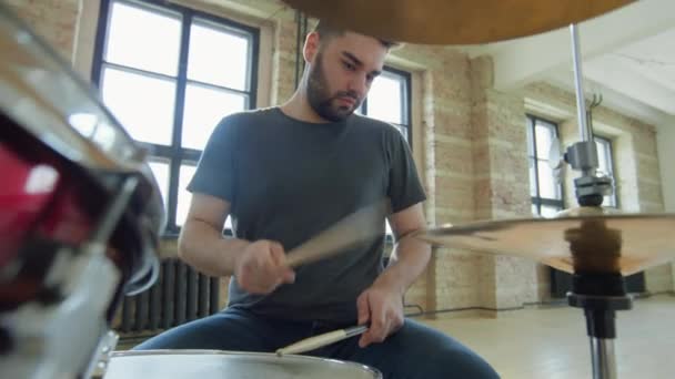 Young Bearded Man Playing Drums Drumsticks While Having Rehearsal Loft — Stock Video