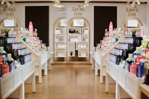 stock image Modern interior of cosmetics store with products on the shelves in shopping mall