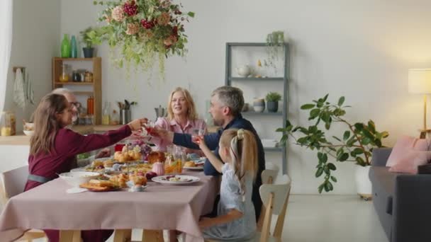 Big Family Clinking Glasses Toast Having Drinks Dinner Table While — Stock Video