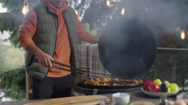 Tilt Shot Man Taking Grilled Meat Steaks Barbecue Putting Them — Stock Video