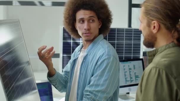 Renewable Energy Developer Explaining Something Solar Panel Male Colleague While — Stock Video