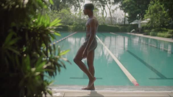 Full Shot Professional Black Swimmer Swimming Cap Trunks Standing Outdoor — Stock Video