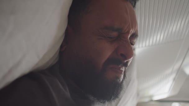 Vertical Close Shot Young Bearded Man Lying Bed Waking Rubbing — Stock Video