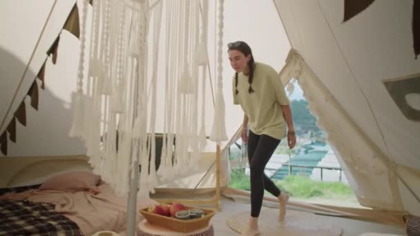 Full Shot Young Woman Walking Comfortable Glamping Tent Taking Apple — Stock Video