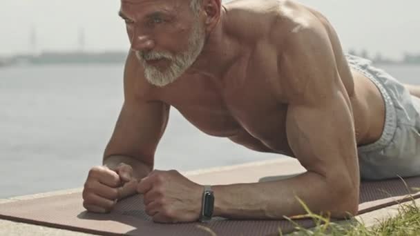Tilt Shot Senior Gray Haired Man Muscular Shirtless Torso Holding — Stock Video