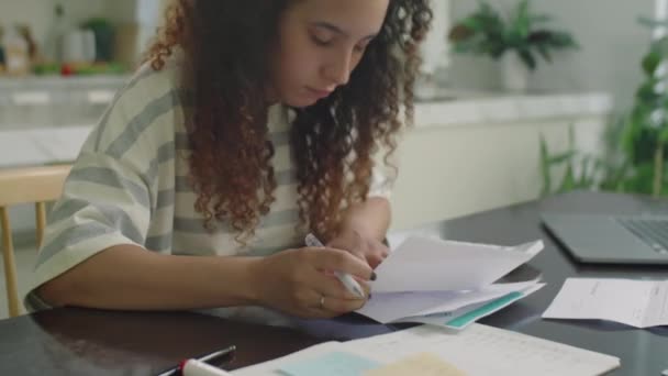 Medium Close Shot Gen Girl Examining Bills Using Calculator Making — Stock Video