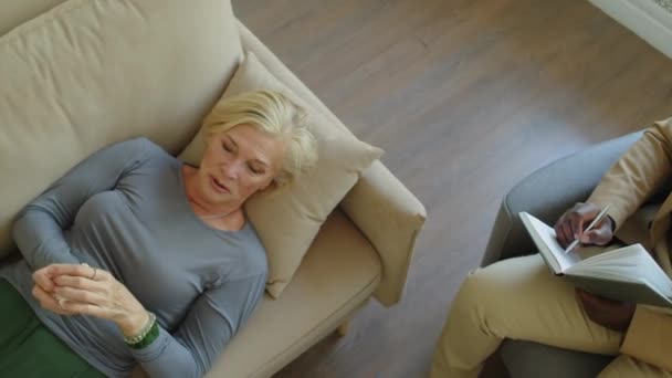 Top Shot Sad Mature Woman Lying Sofa Telling Depression Therapist — Stock Video