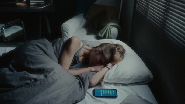 High Angle Shot Depressed Girl Lying Bed Turned Smartphone Feeling — Stock Video